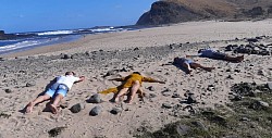 Suntanning savasana relaxation beach hole in the wall hike new friends